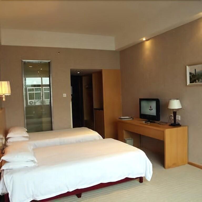 Шанграо: Wuyuan Xingjiang Bay Holiday Hotel