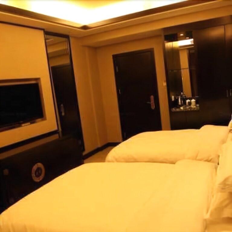 Шанграо: Wuyuan Xingjiang Bay Holiday Hotel