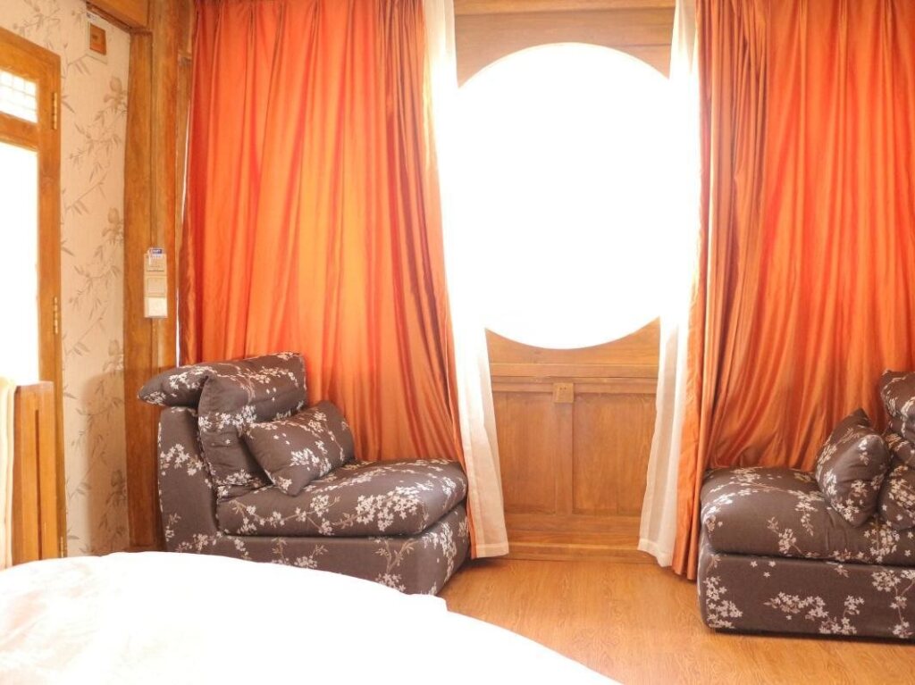 Лицзян: Lijiang Happyland Inn