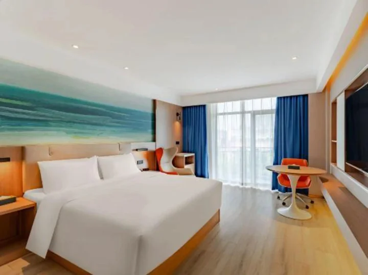 Уху: Aiwei Shangpin Hotel