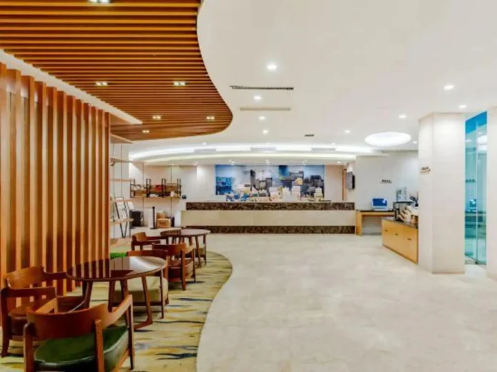 Уху: Aiwei Shangpin Hotel