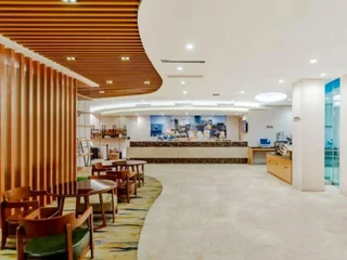Уху: Aiwei Shangpin Hotel