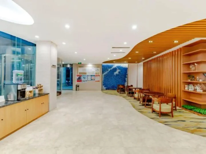 Уху: Aiwei Shangpin Hotel