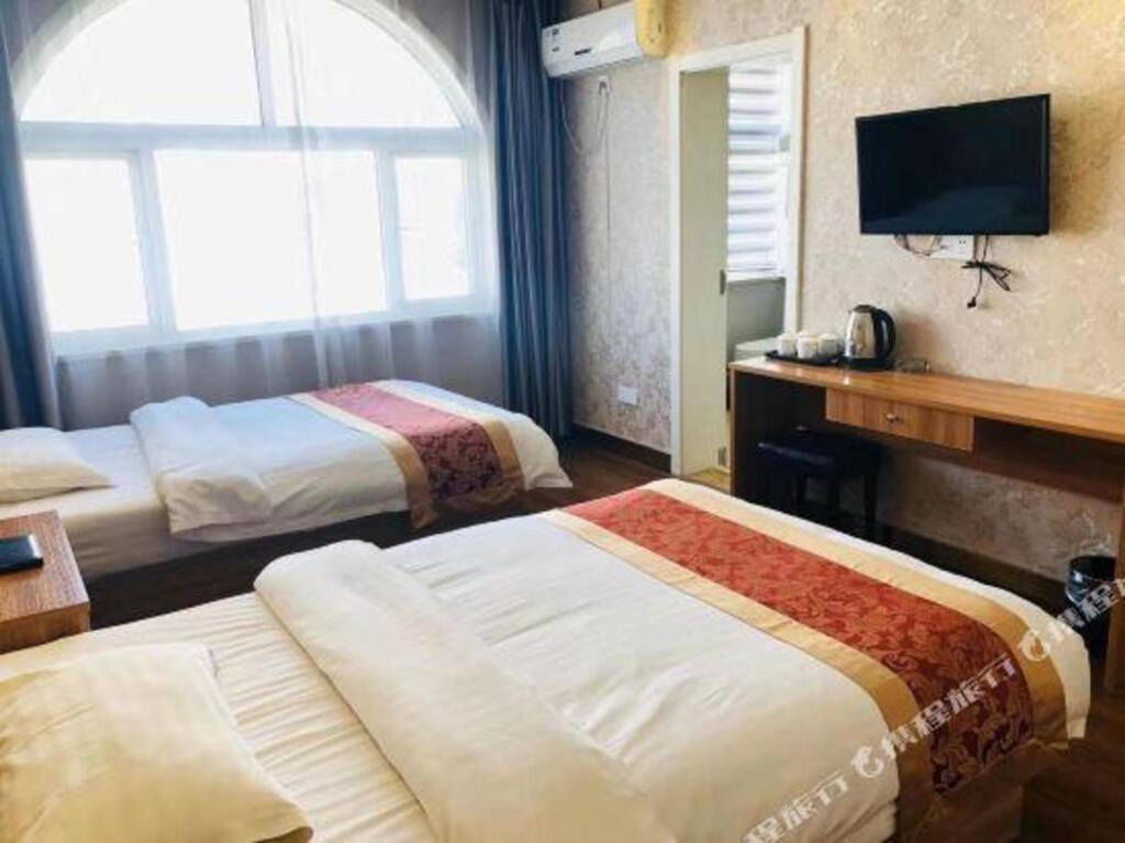 Лоян: Yake Light House Hotel (Luoyang Longmen High-speed Railway Station Kaiyuan Avenue)