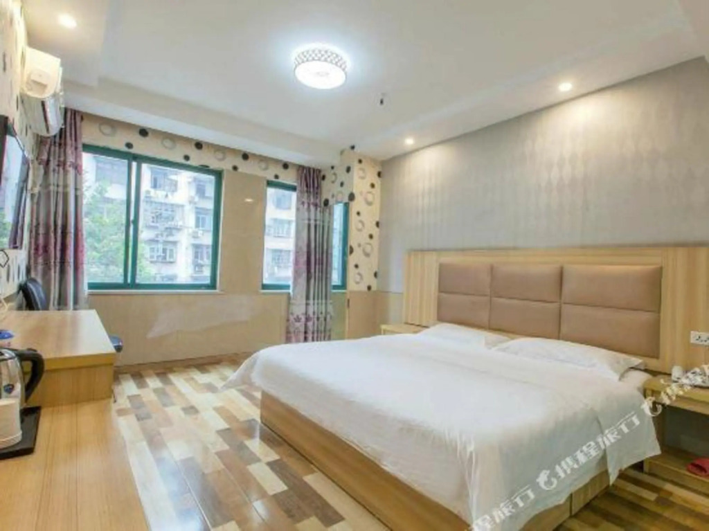 Ухань: New Beacon Shangju Hotel (Hanzhengjie Subway Station Wuzhan Convention Center)