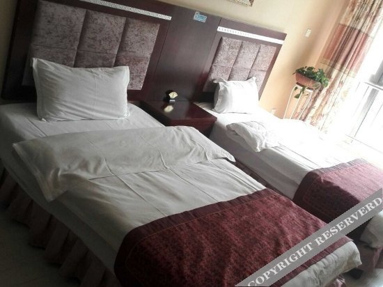 Синин: Xinya Family Hotel