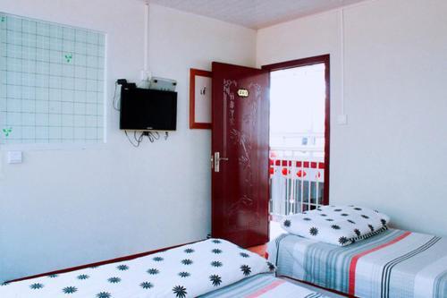 Жичжао: Rizhao Yiyu Fengshang Home Inn