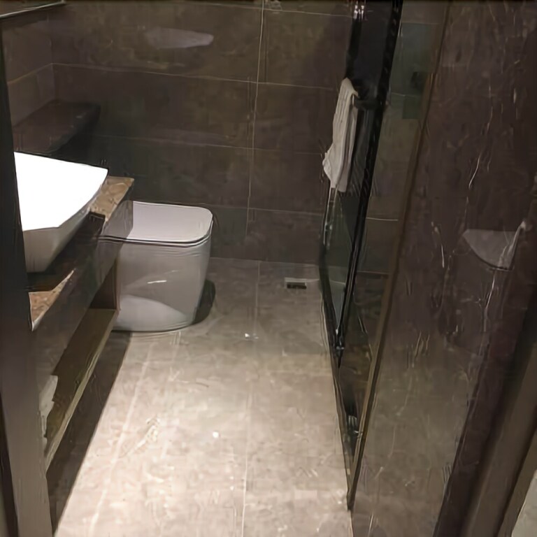 Чжаньцзян: Zhouji Business Hotel