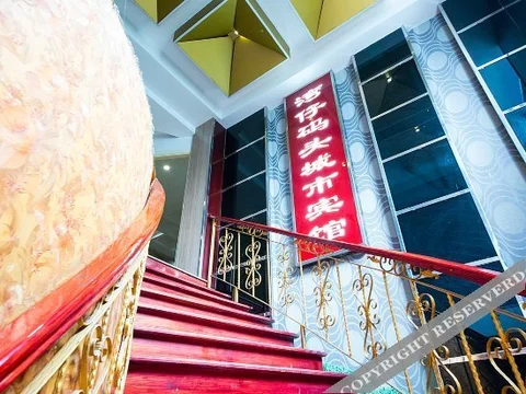 Уси: Wanzai Matou City Hotel