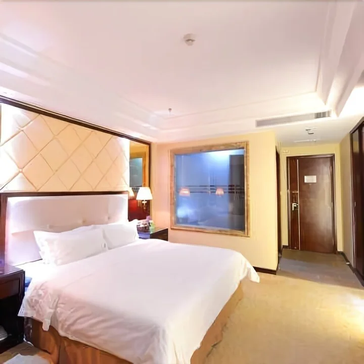 Пуэр: Basaicheng Hotel