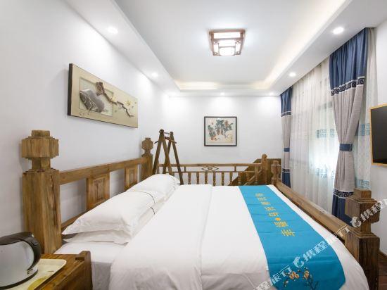 Сянси: Xingfu Wutuobang Gufeng Qingshe Hostel