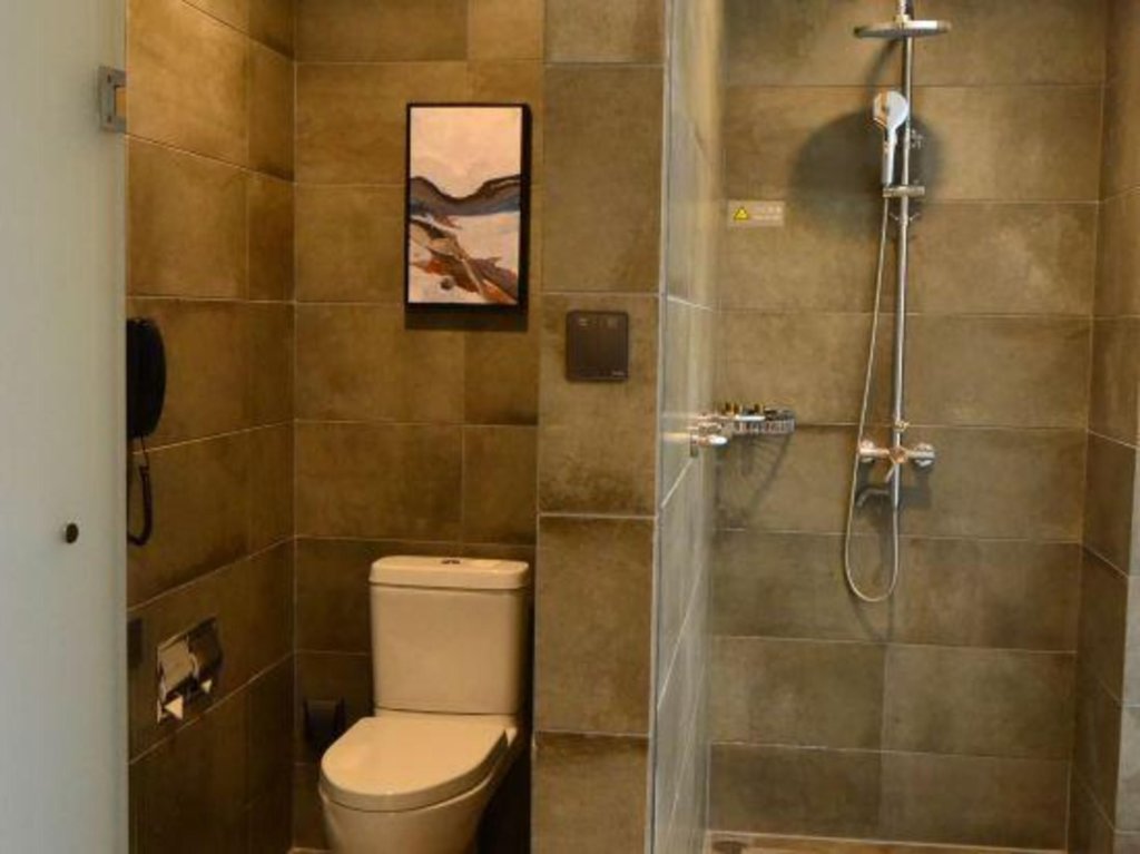 Циндао: Jinjiang Metropolo Hotel - Qingdao Xinduxin