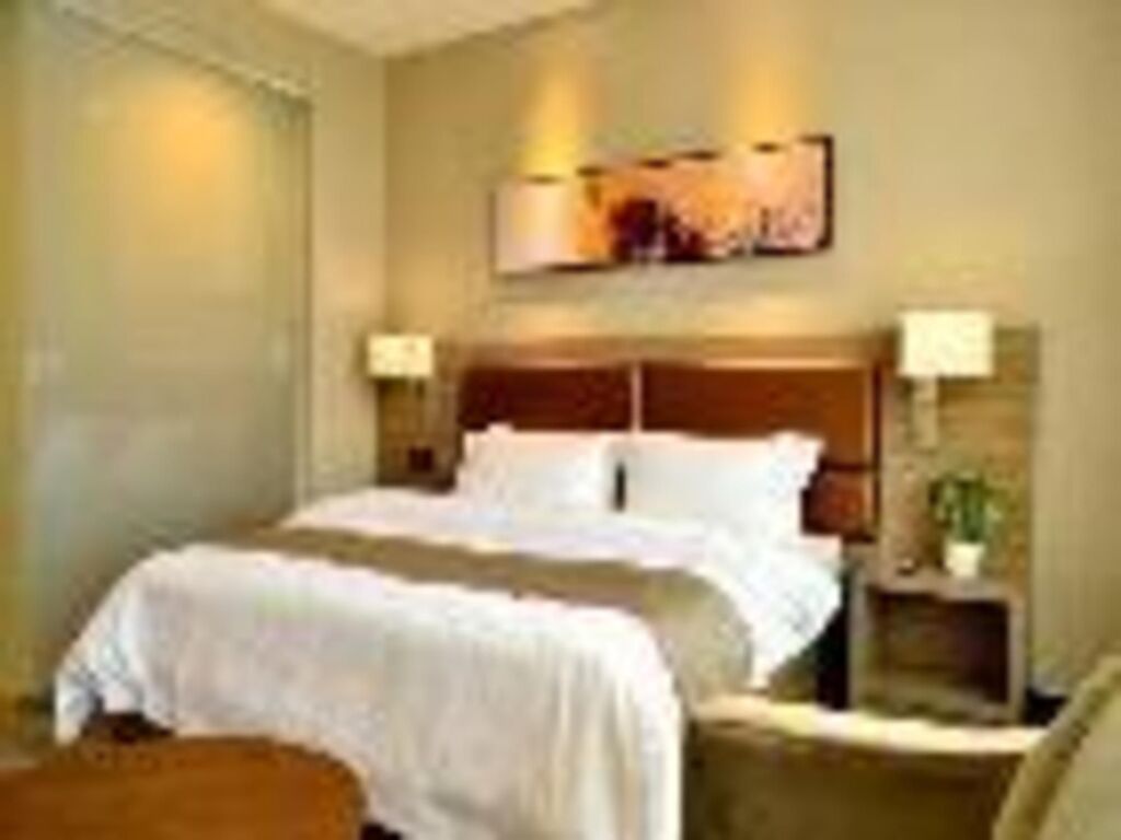 Циндао: Jinjiang Metropolo Hotel - Qingdao Xinduxin