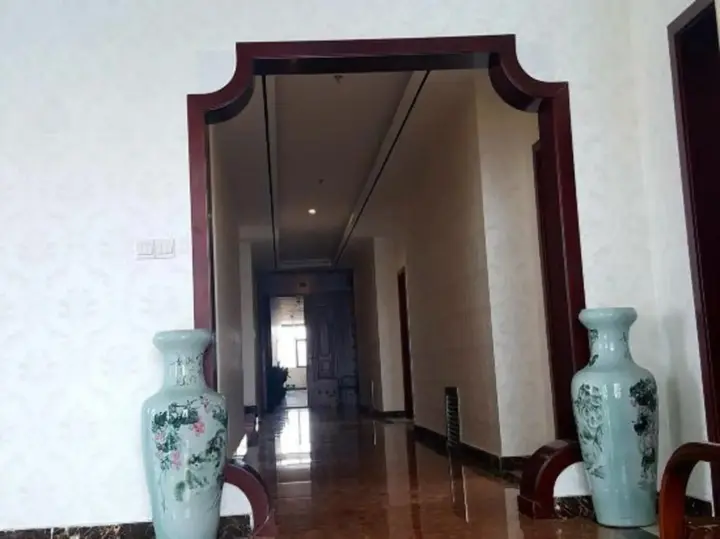 Линьи: Huanle Business Hotel