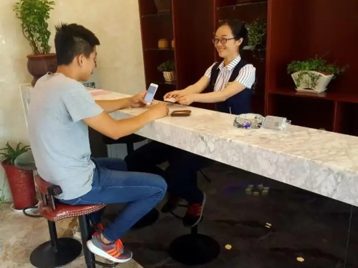Линьи: Huanle Business Hotel