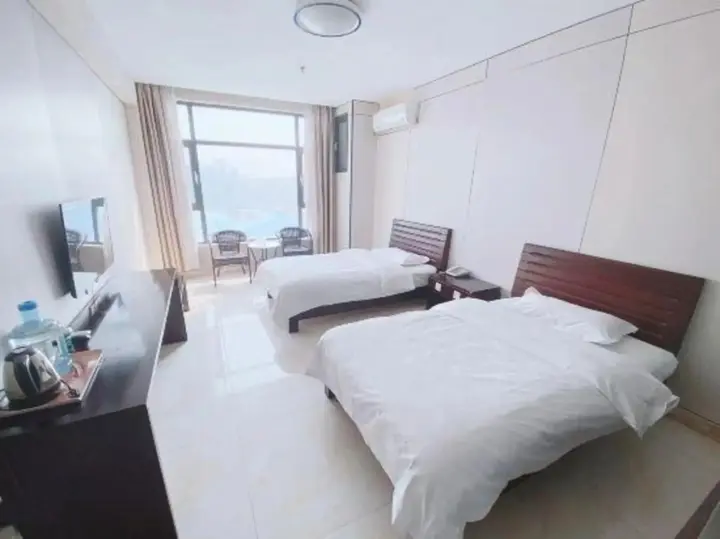 Линьи: Huanle Business Hotel