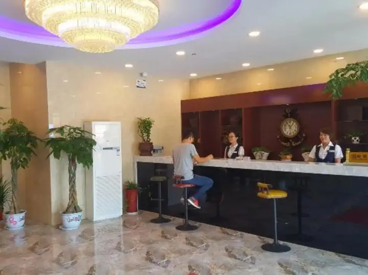 Линьи: Huanle Business Hotel