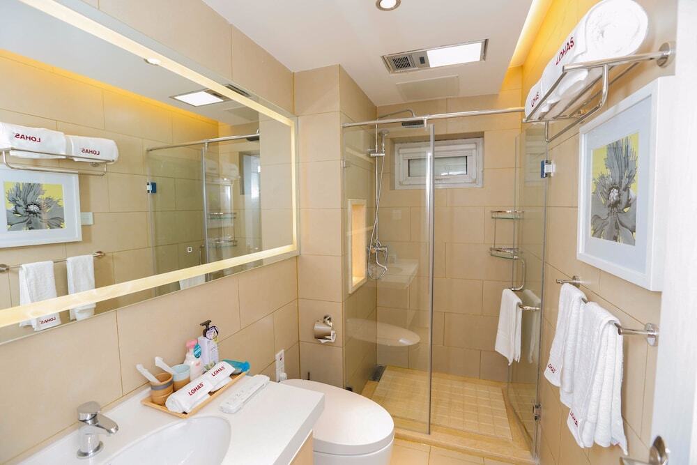 Циндао: Qingdao Lohas Home Hotel