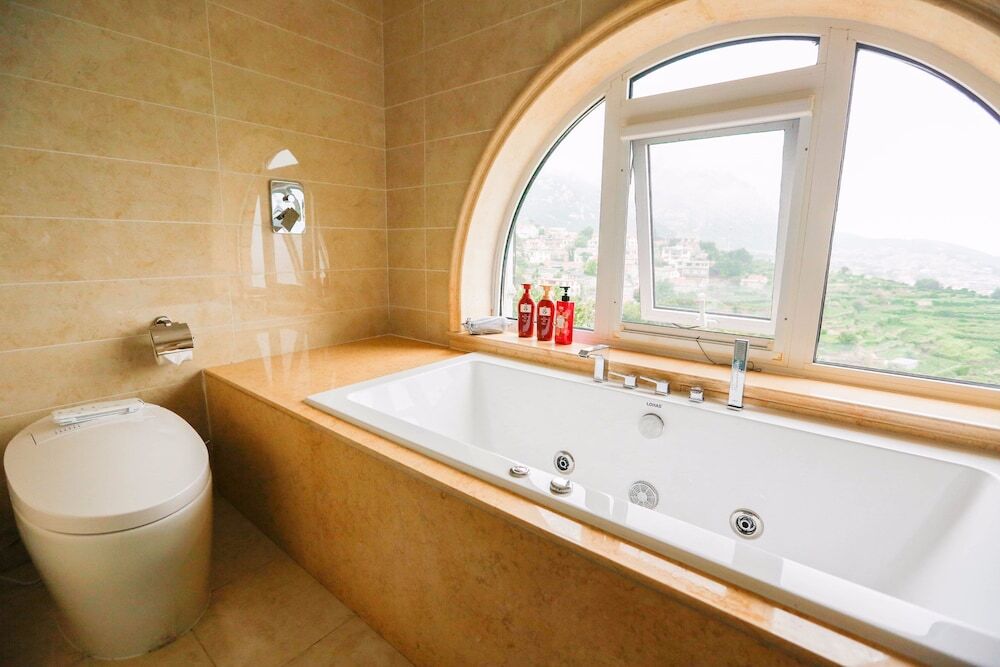 Циндао: Qingdao Lohas Home Hotel