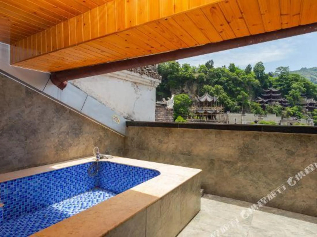 Уян: Wushi Ju | Zhenyuan Ancient Town Riverside Homestay