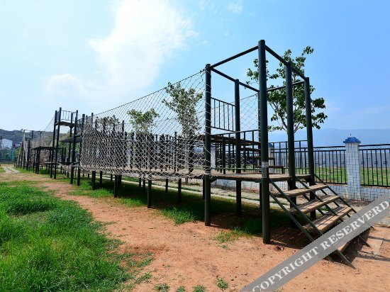 Панжихуа: Taiyang Muge Village Hotel