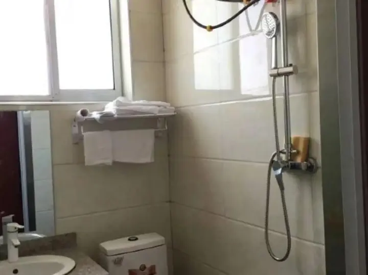 Линьи: Tangjia Hotel