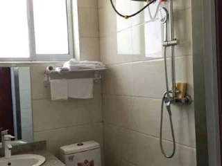 Линьи: Tangjia Hotel