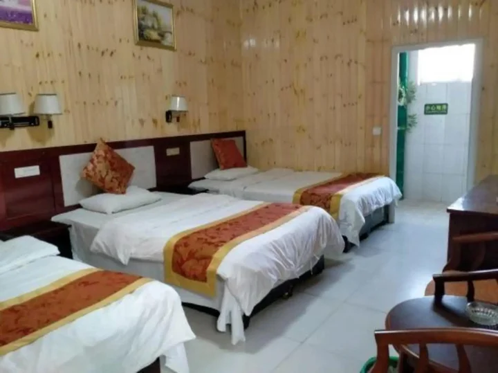 Линьи: Tangjia Hotel