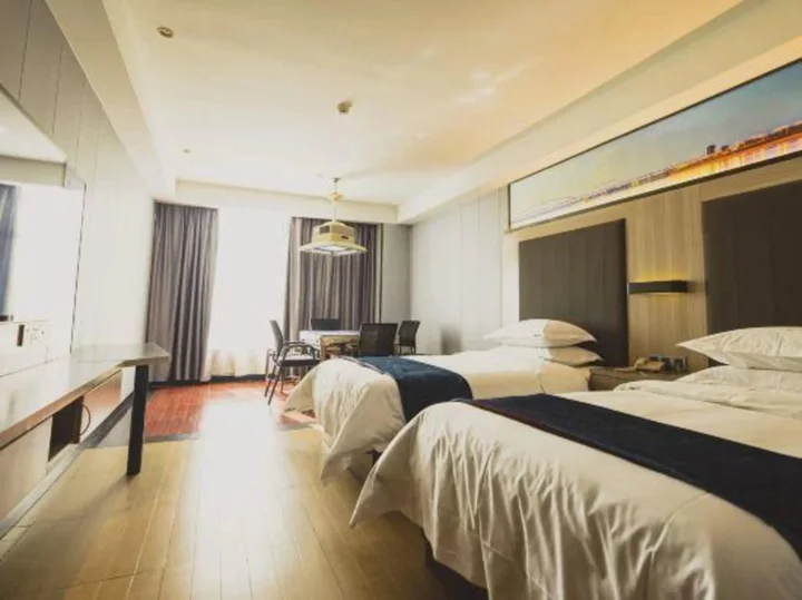 Йиян: Junkai Business Hotel