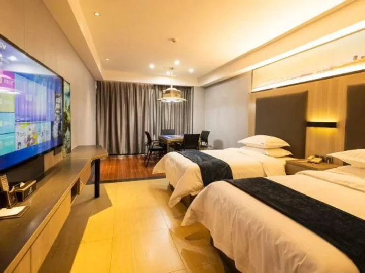 Йиян: Junkai Business Hotel