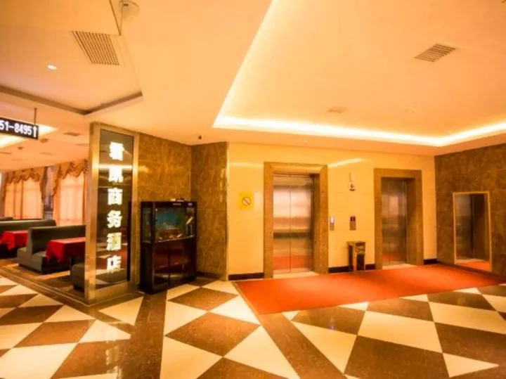 Йиян: Junkai Business Hotel