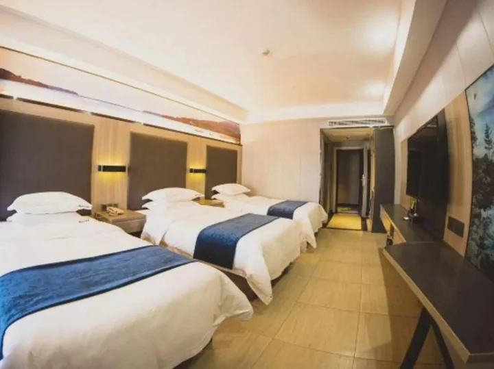 Йиян: Junkai Business Hotel