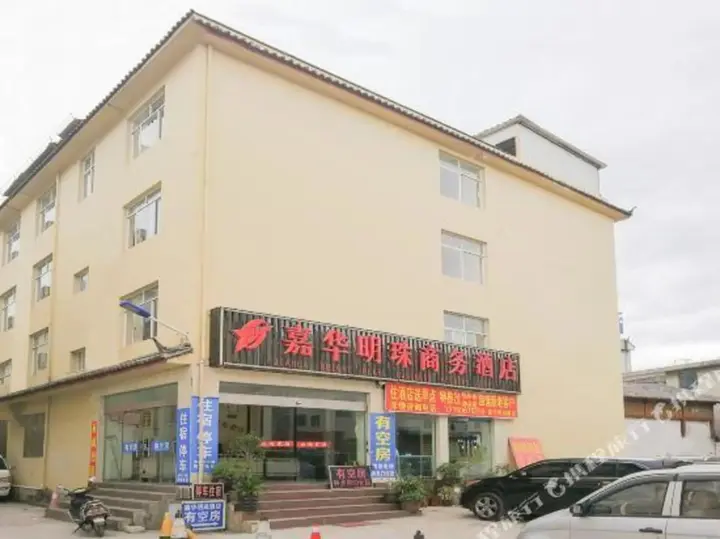 Лицзян: Lijiang Xinhua Business Hotel