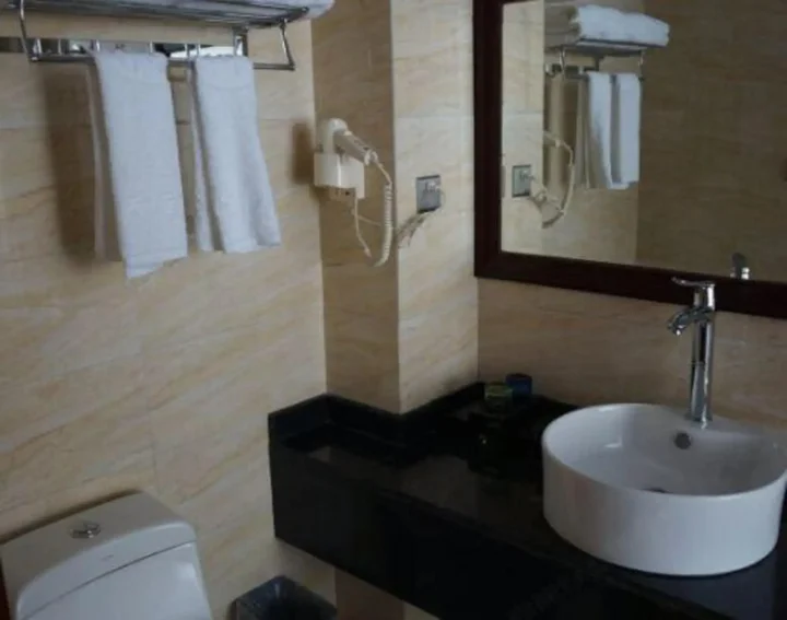 Яань: Hongyan Business Hotel