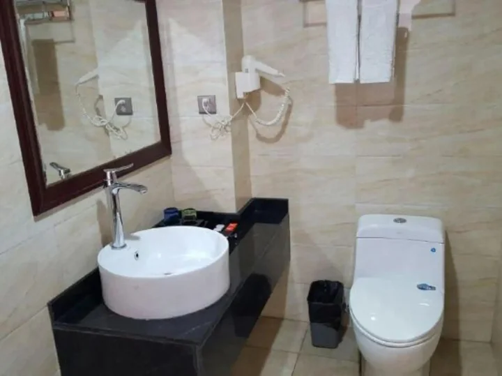 Яань: Hongyan Business Hotel