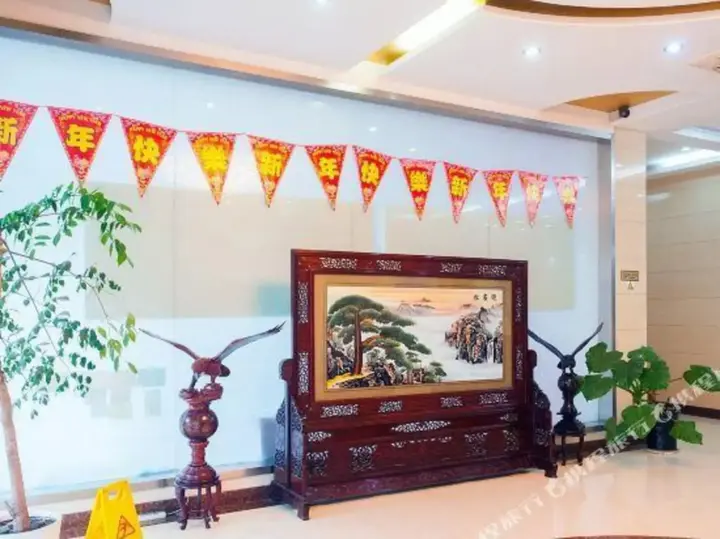 Наньтун: Xinding Business Hotel