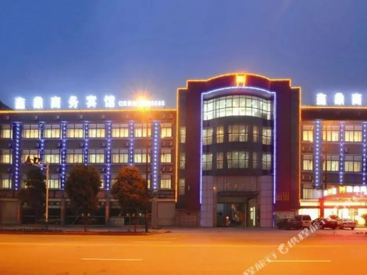 Наньтун: Xinding Business Hotel