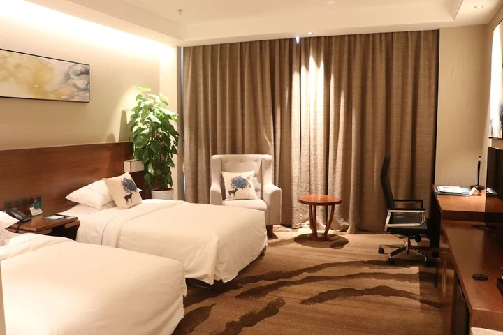 Яньтай: Yantai Dexin International Hotel