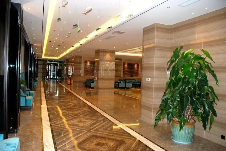 Яньтай: Yantai Dexin International Hotel