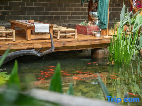 Пучжэхэй: Puzhehei Yidu Homestay (Hehua Daguan Garden)