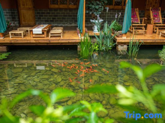 Пучжэхэй: Puzhehei Yidu Homestay (Hehua Daguan Garden)