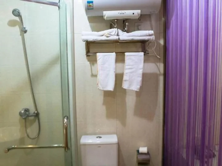 Шаоксинг: Paojiang Xinyuansu Business Hotel