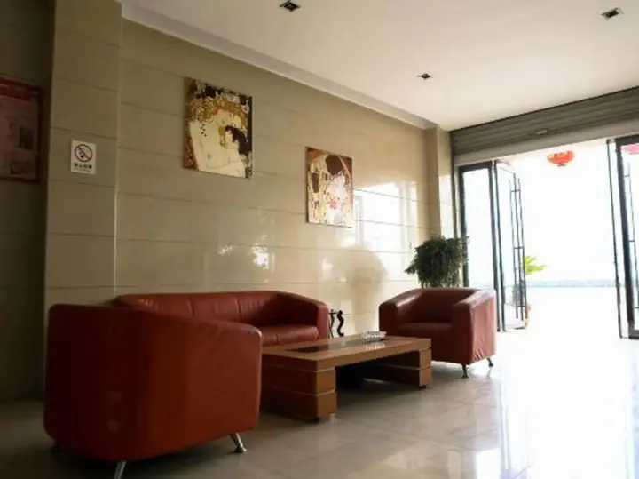 Шаоксинг: Paojiang Xinyuansu Business Hotel