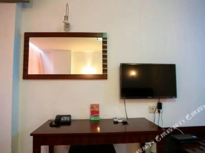 Шаоксинг: Paojiang Xinyuansu Business Hotel