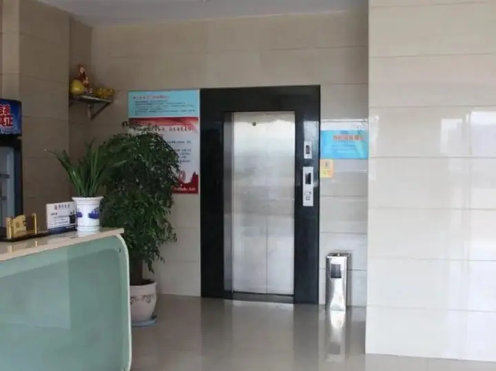 Шаоксинг: Paojiang Xinyuansu Business Hotel