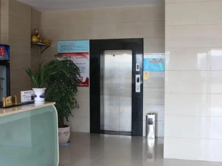 Шаоксинг: Paojiang Xinyuansu Business Hotel