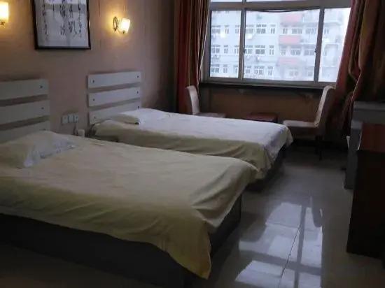 Пуян: Dengfeng Business Hotel