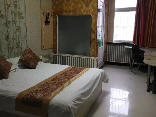 Пуян: Dengfeng Business Hotel