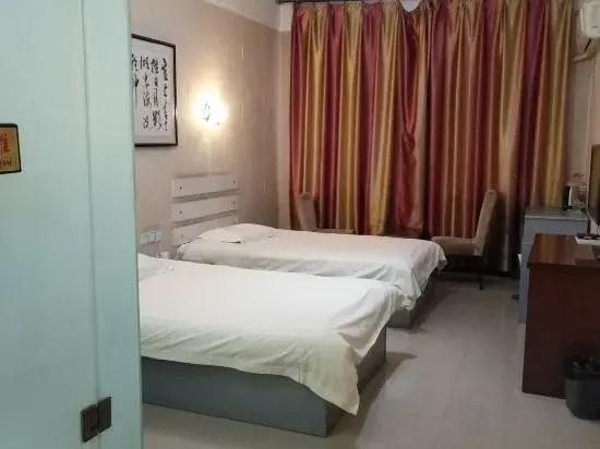 Пуян: Dengfeng Business Hotel