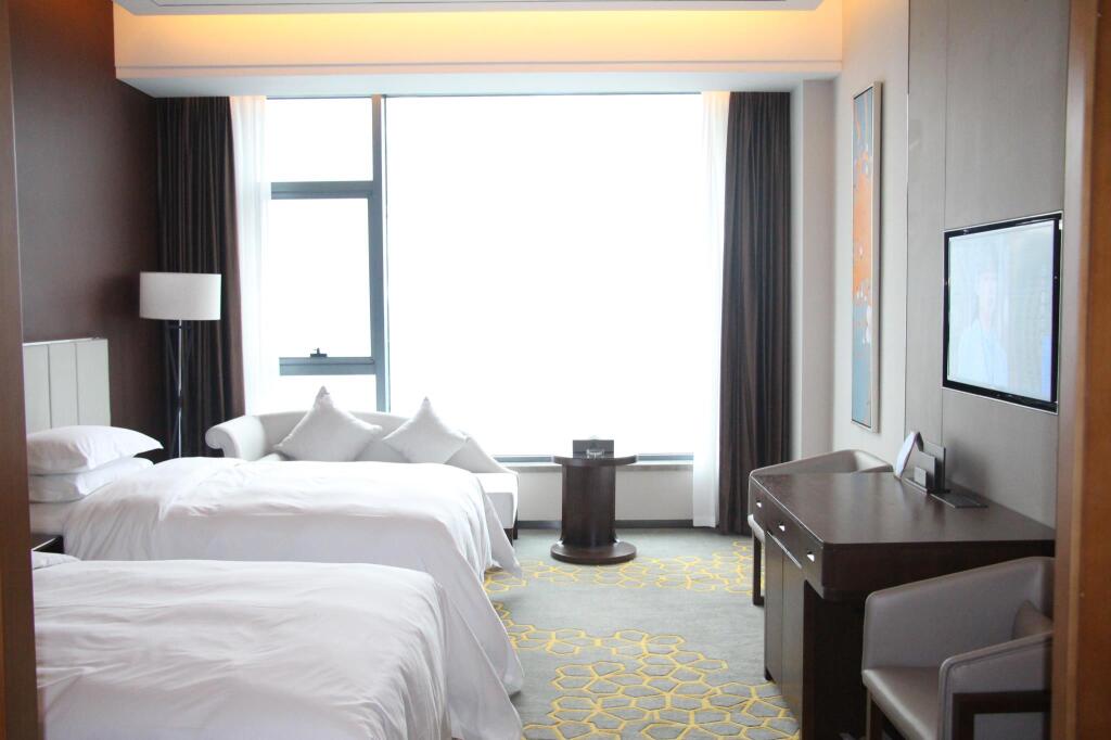 Вэйнань: Shaanxi Hancheng Qiangda Grand Skylight Hotel